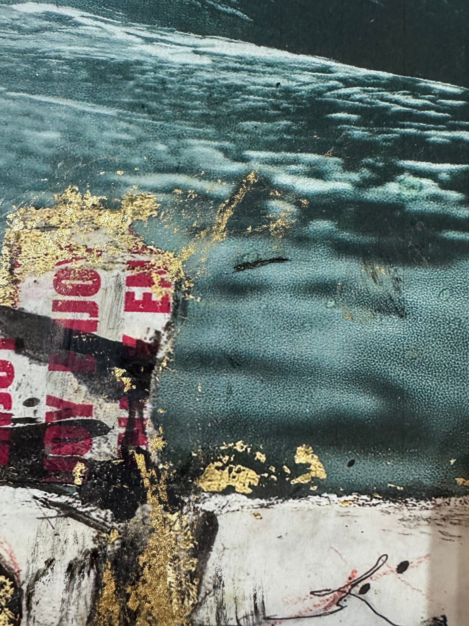 Abstract art piece with text and color splashes on a textured background