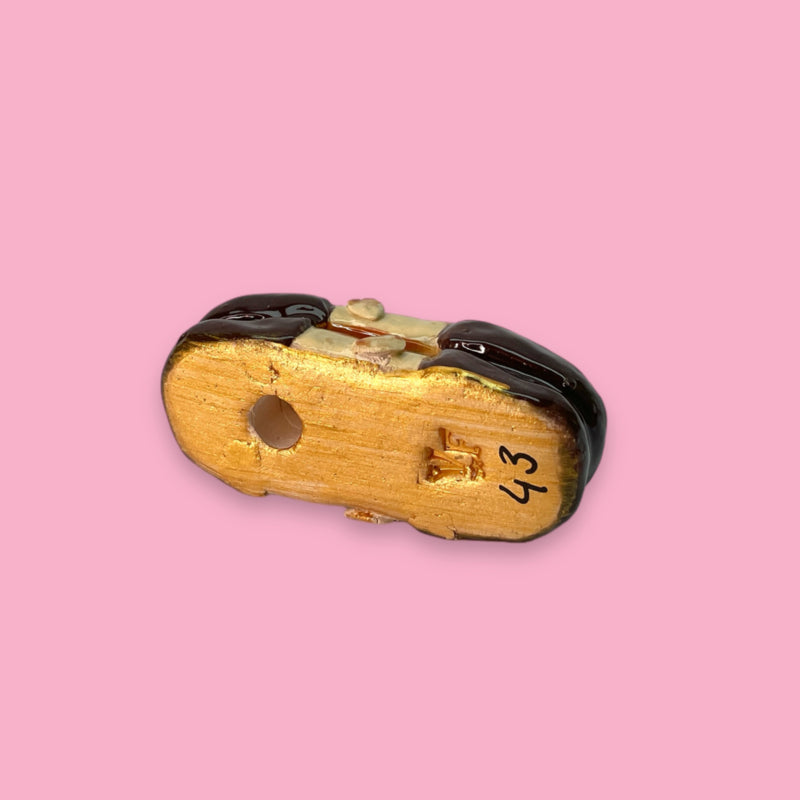 ceramic replica of Dutch cookie with chocolate