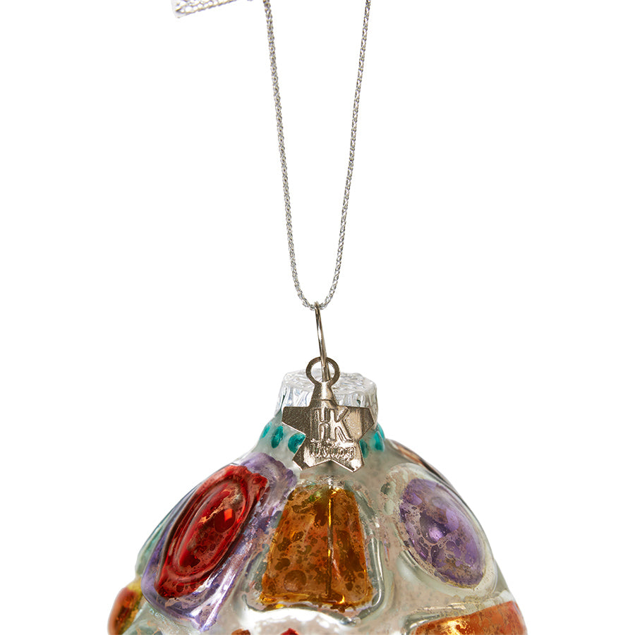 detail of glass Christmas ornament with artsy design