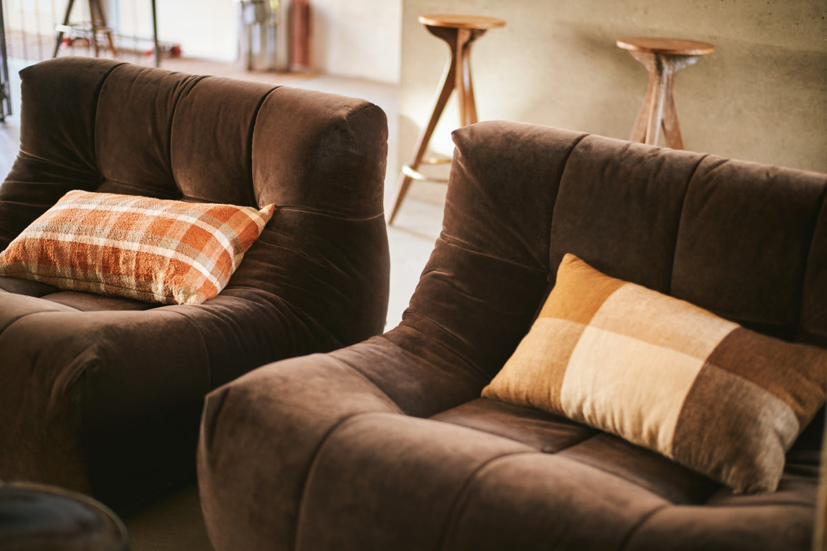 velvet brown element recliner lounge chairs with throw pillows