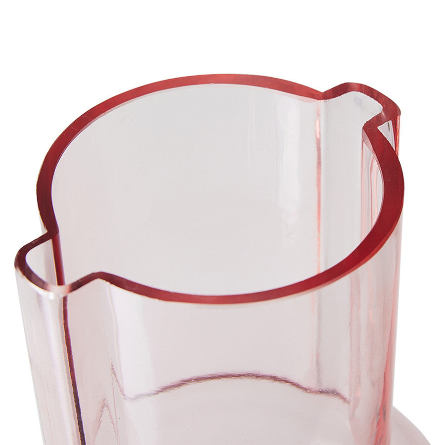 top of small pink glass vase