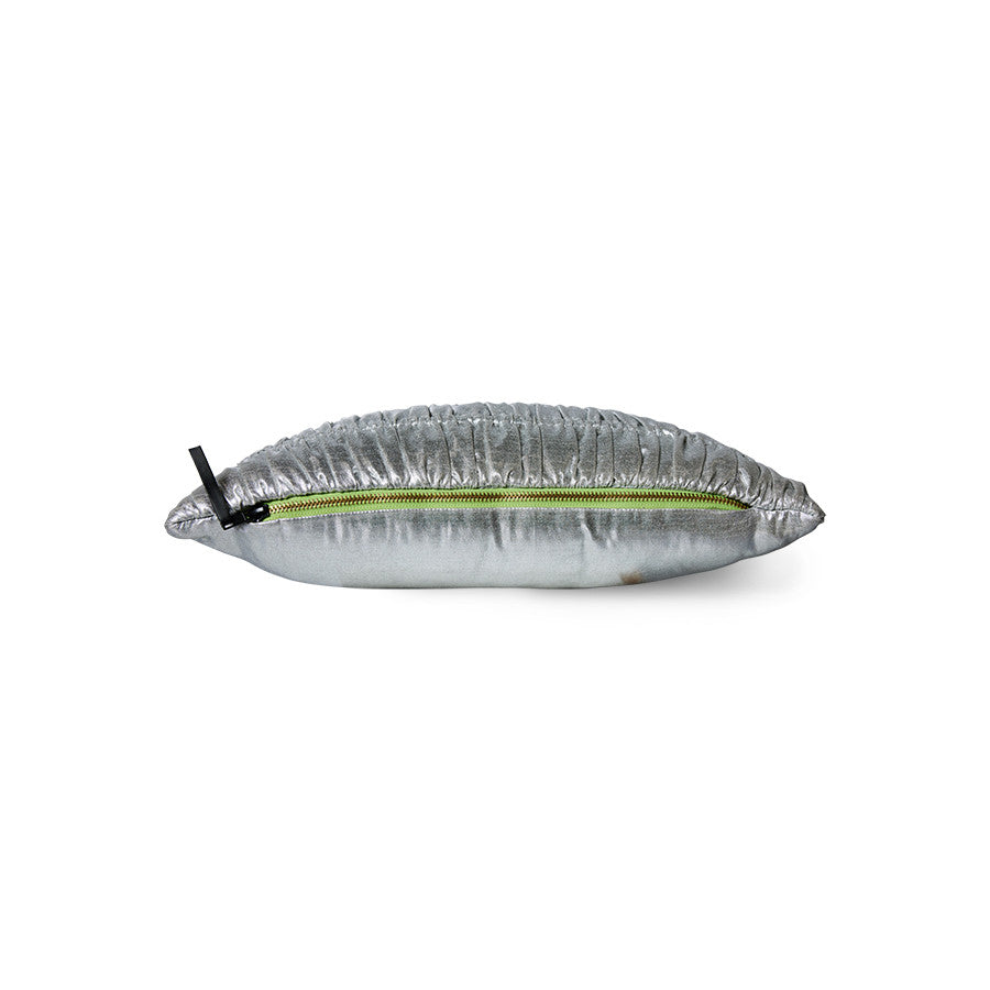 textured wrinkled silver pillow with green fabric where zipper is