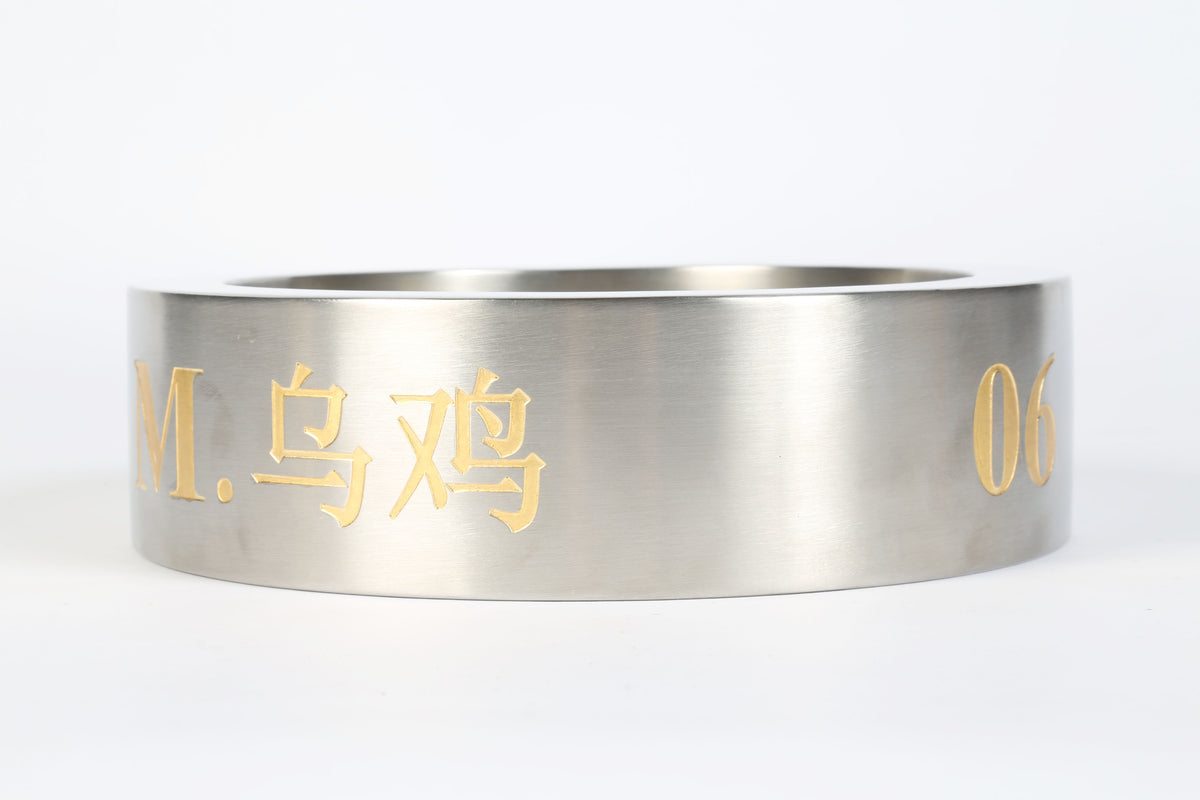 stainless steel ring with gold engraving