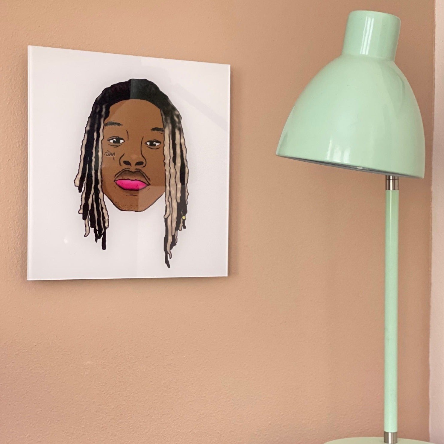 art work in acrylic on wall with green table lamp