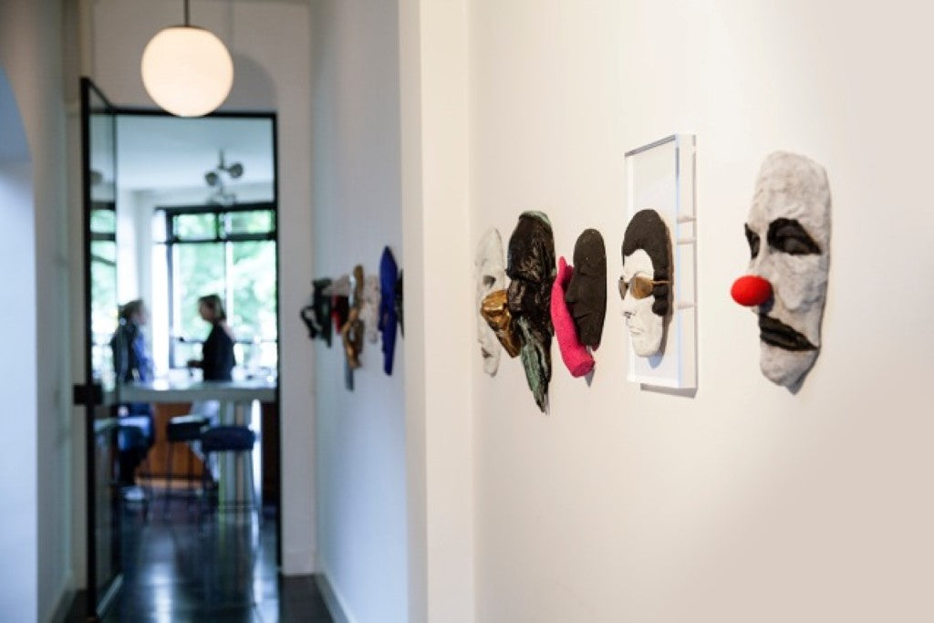 house of an art collector with a row of 3d bronze sculptures made by renee van leusden