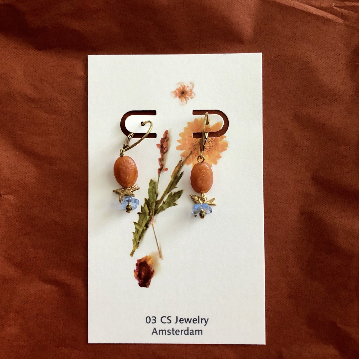 hummingbird and blue flower earring