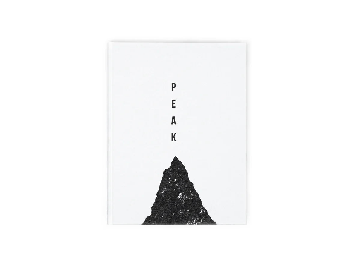 Black mountain silhouette with 'PEAK' text on a white background
