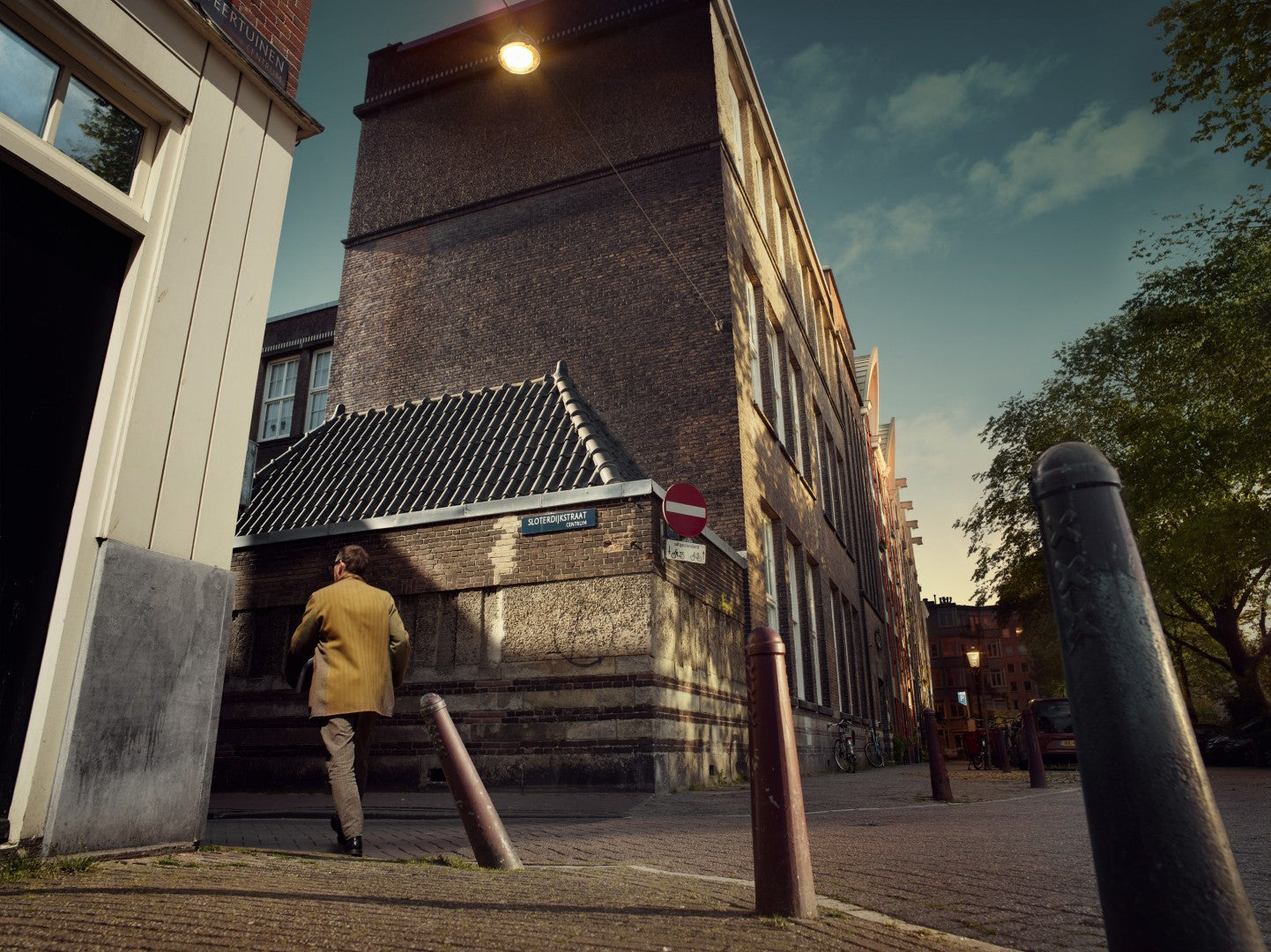 man walking on street in Amsterdam 