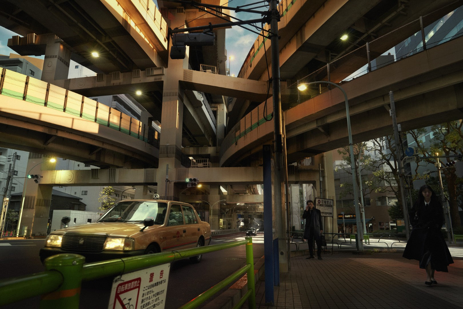 City street with overpasses and a taxi at dusk
