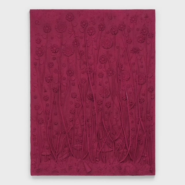 Pink mixed media art work with a floral pattern 