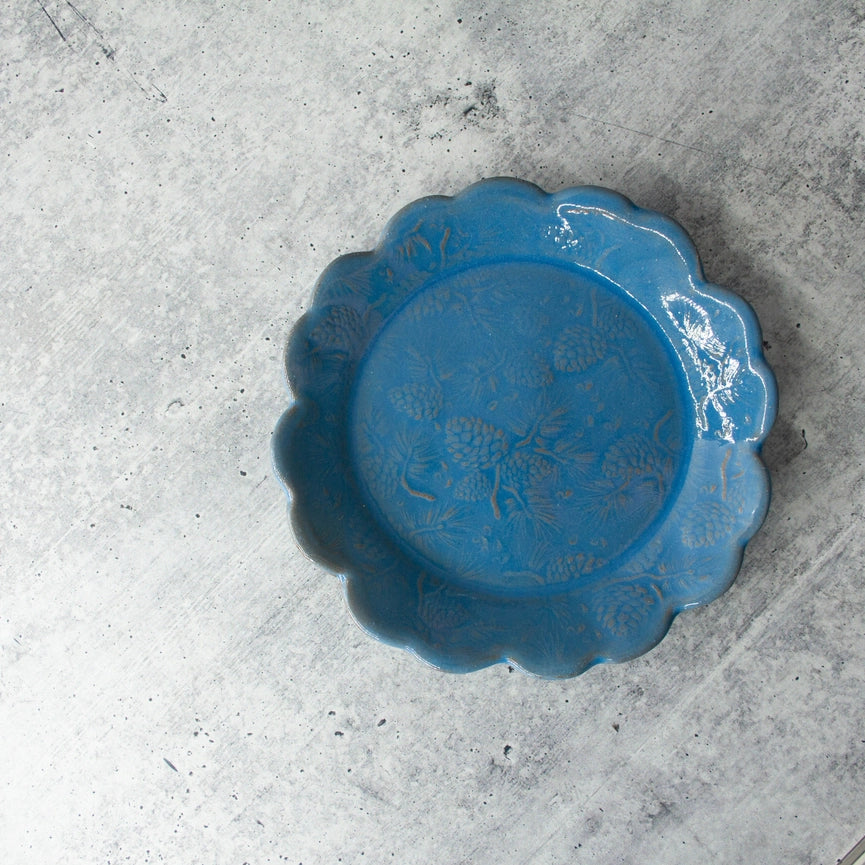 bread and butter side plate blue on grey background