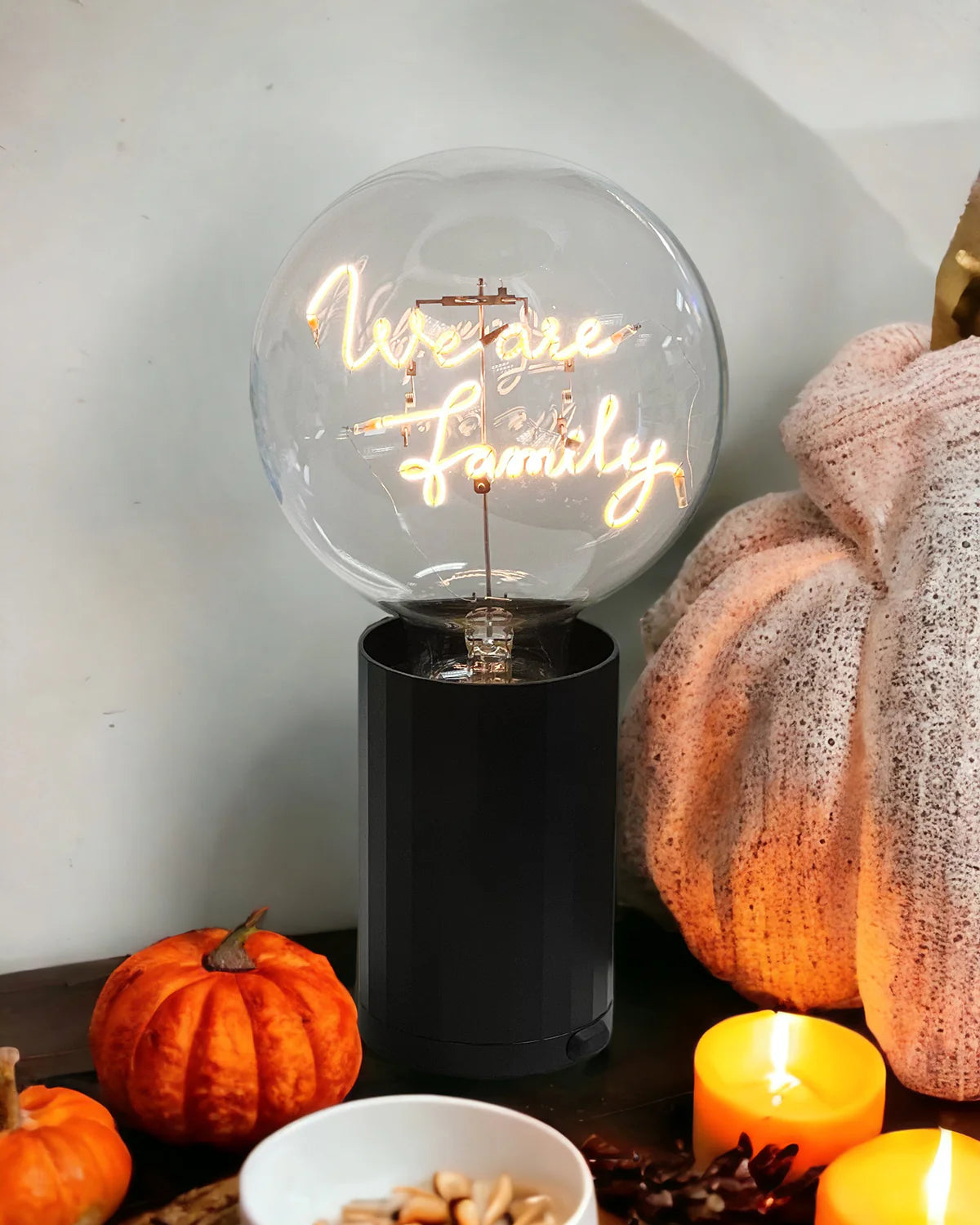 black base neon letters we are family table lamp