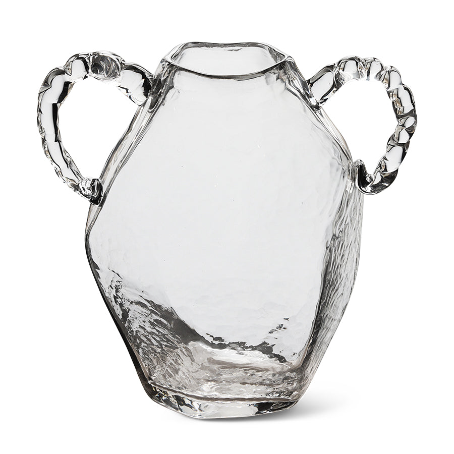 Clear glass pitcher with handles on a white background