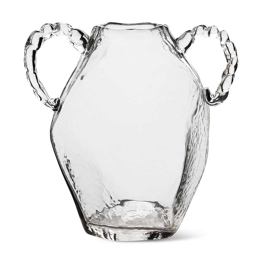 Clear glass pitcher with handles on a white background