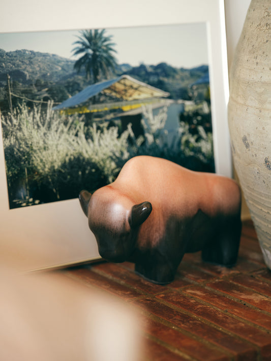 ceramic bull with brown reactive glaze finish