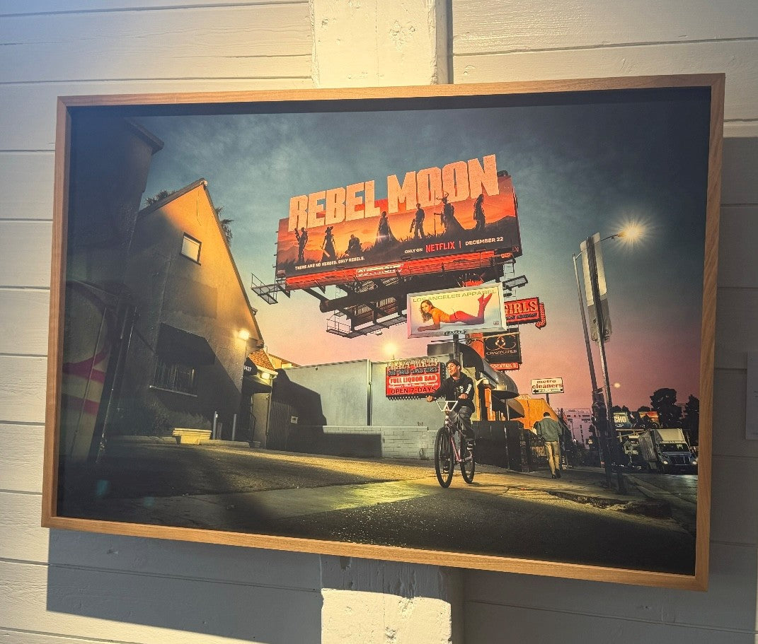 framed picture on a white wooden wall