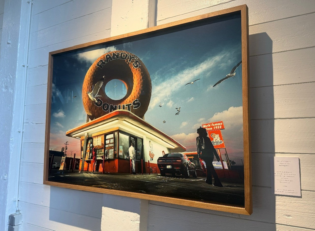 framed picture on white wall