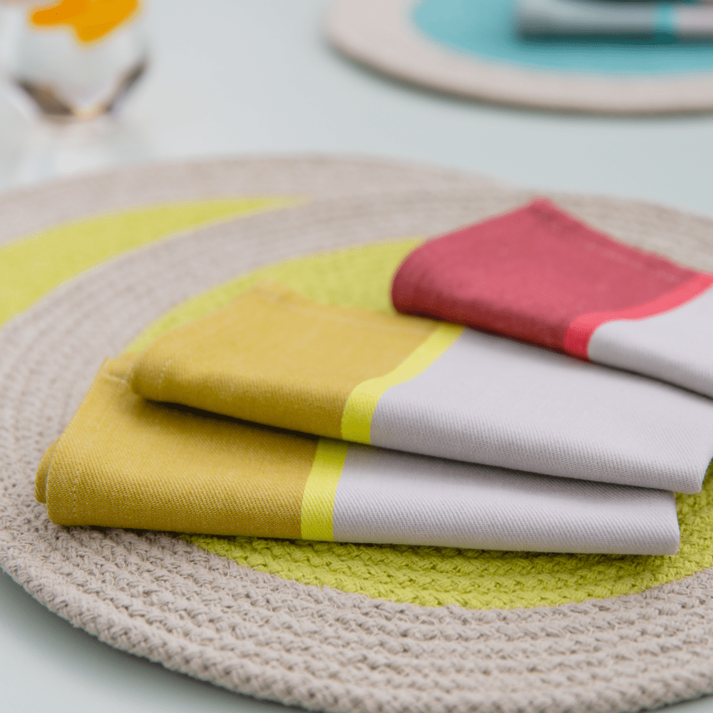 cotton napkins in two tones of yellow, red  and light gray