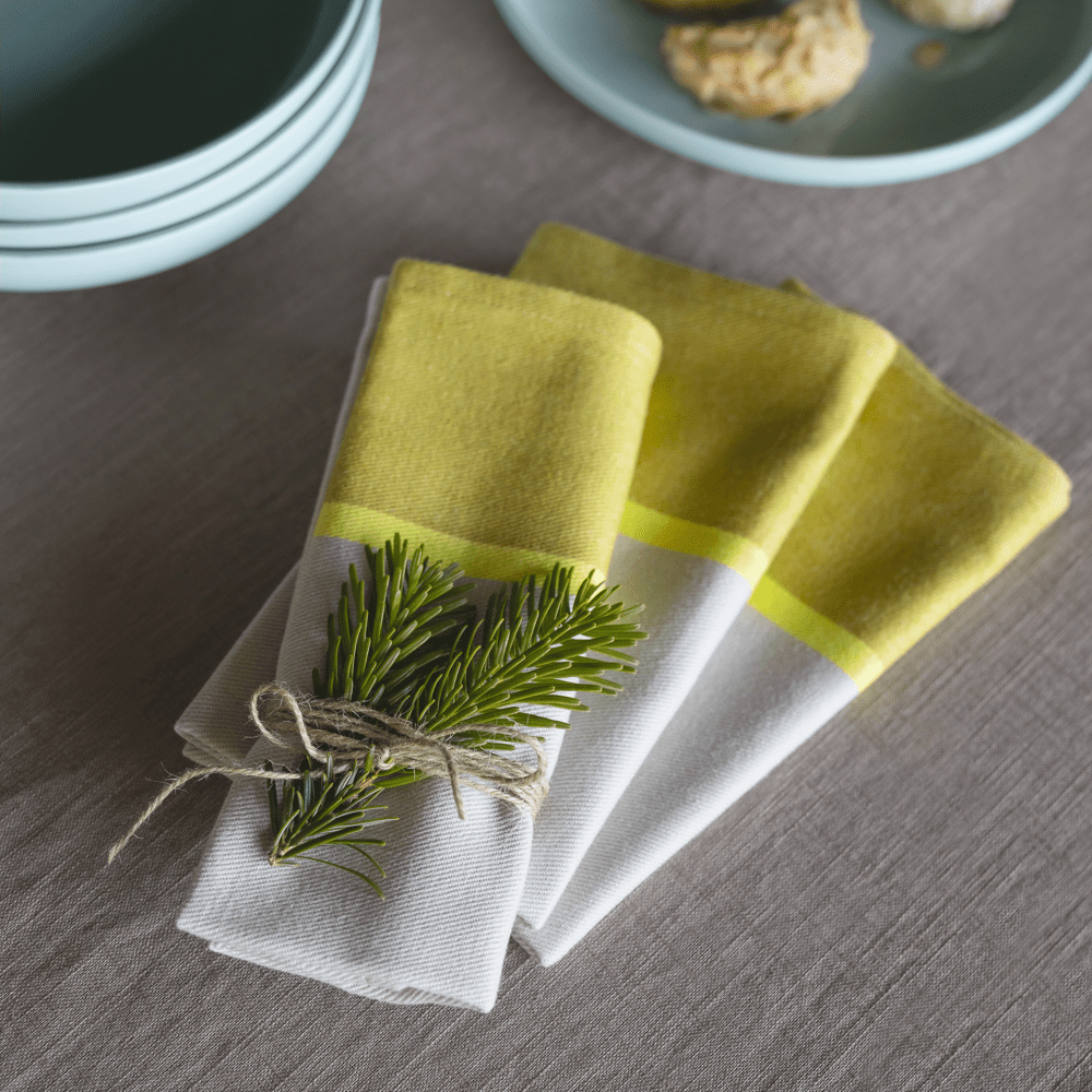 cotton napkins in two tones of yellow and light gray