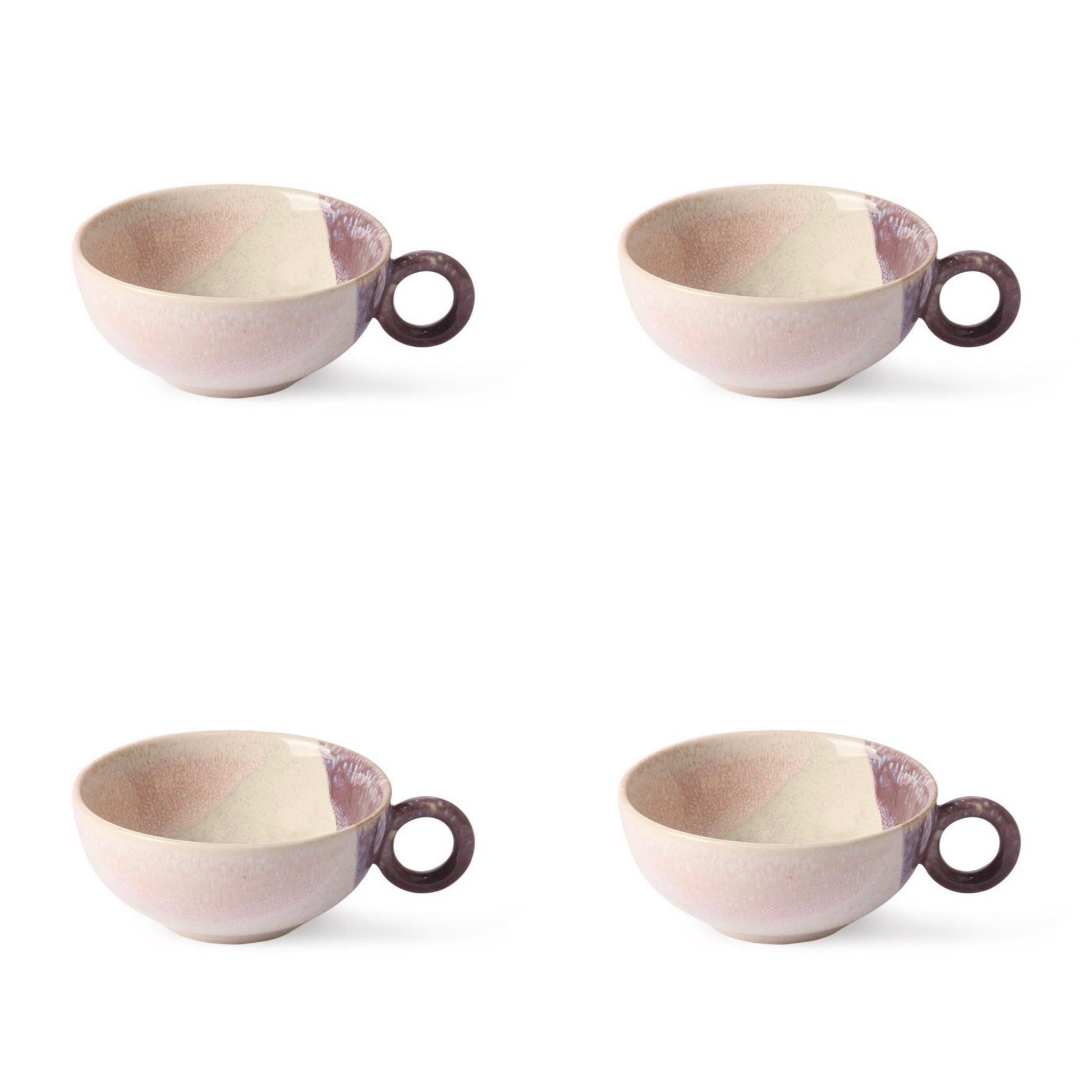 4 pastel colored tea cups with ear