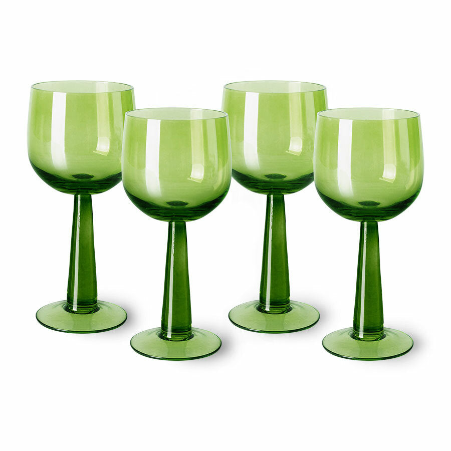 green colored high stem wineglasses