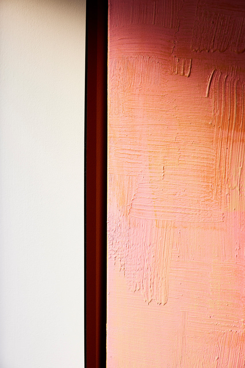 detail of pink abstract painting with brown acrylic shadow box