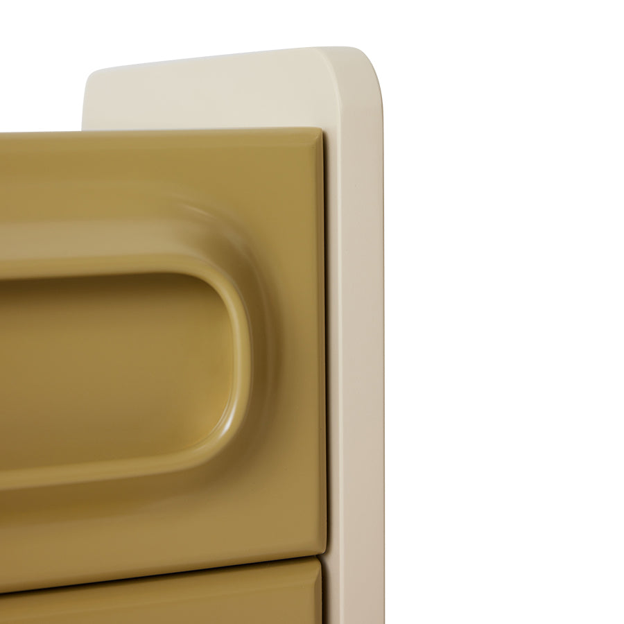 detail retro style nightstand with two drawers in sage green with cream