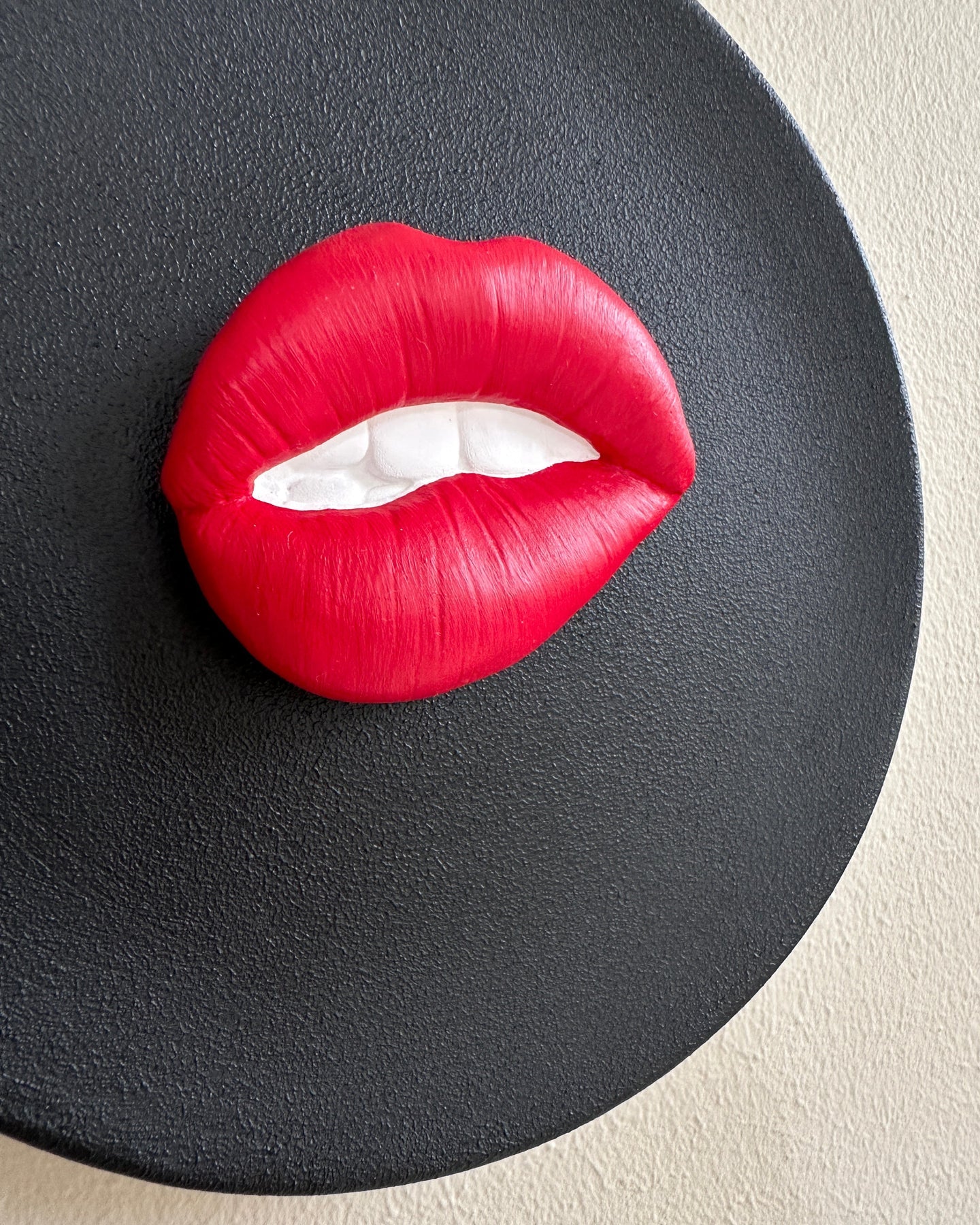Red lips on a black background