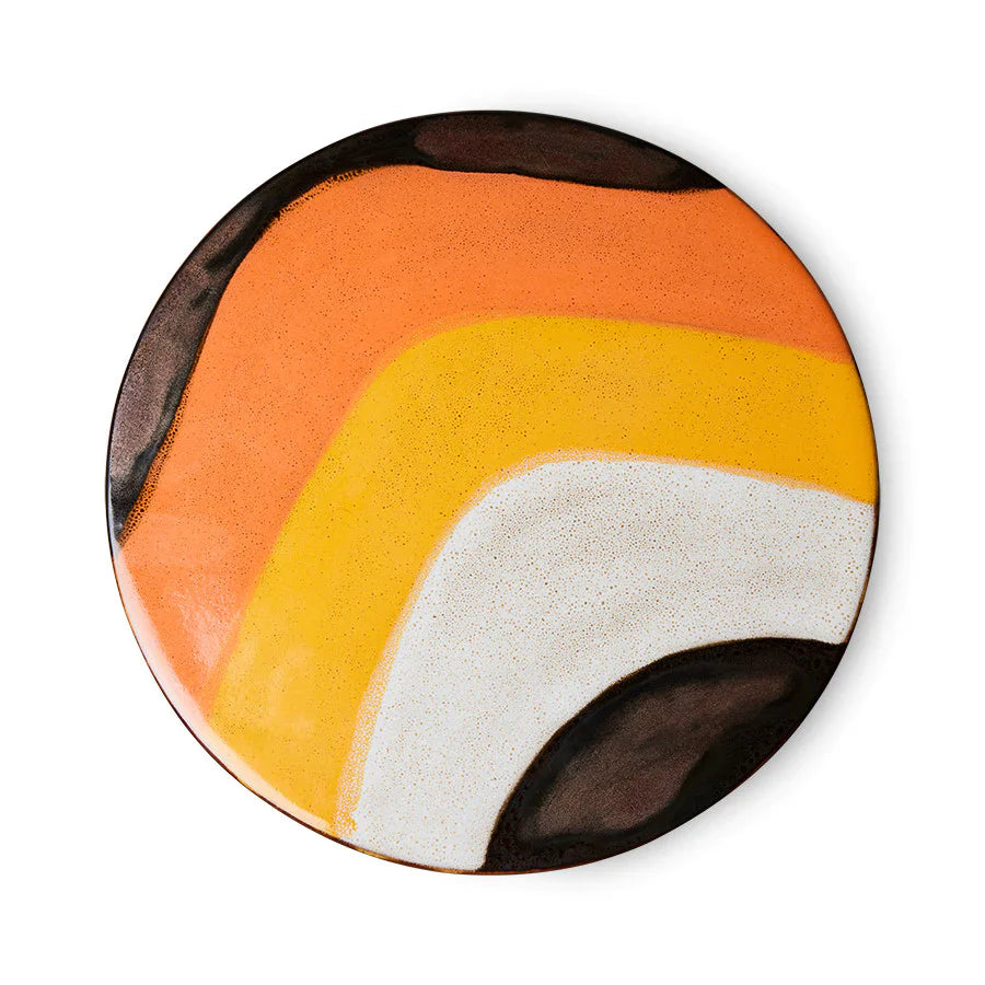 round cake stand with brown, orange and yellow retro style design glazing