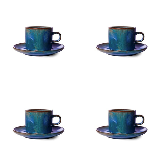 cup and saucer made from porcelain with a rustic blue glazed finish