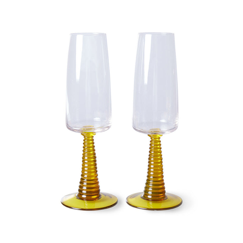 champagne glasses with ochre colored stem