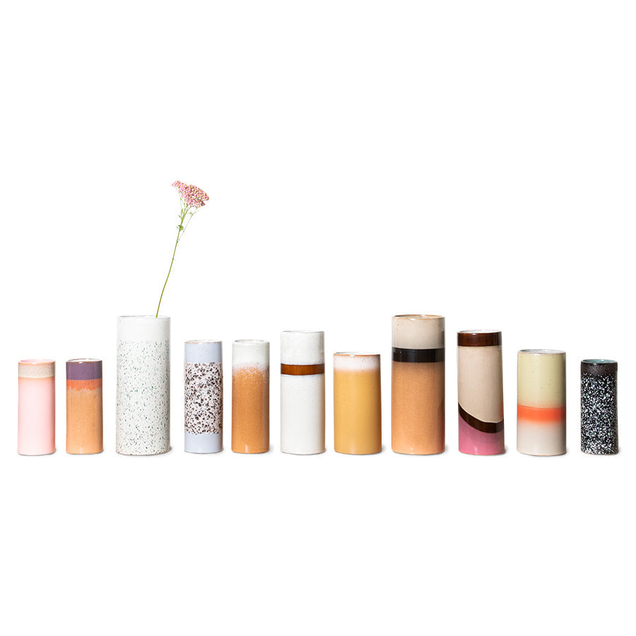 line up of retro style flower vases