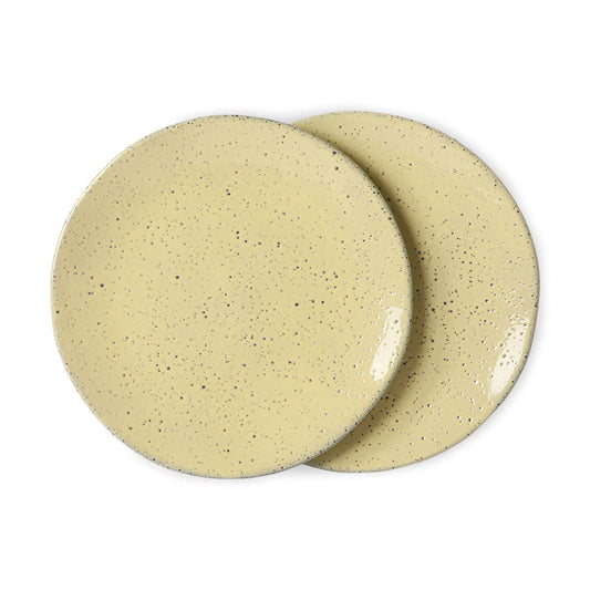 two ceramic plates in yellow with black speckles
