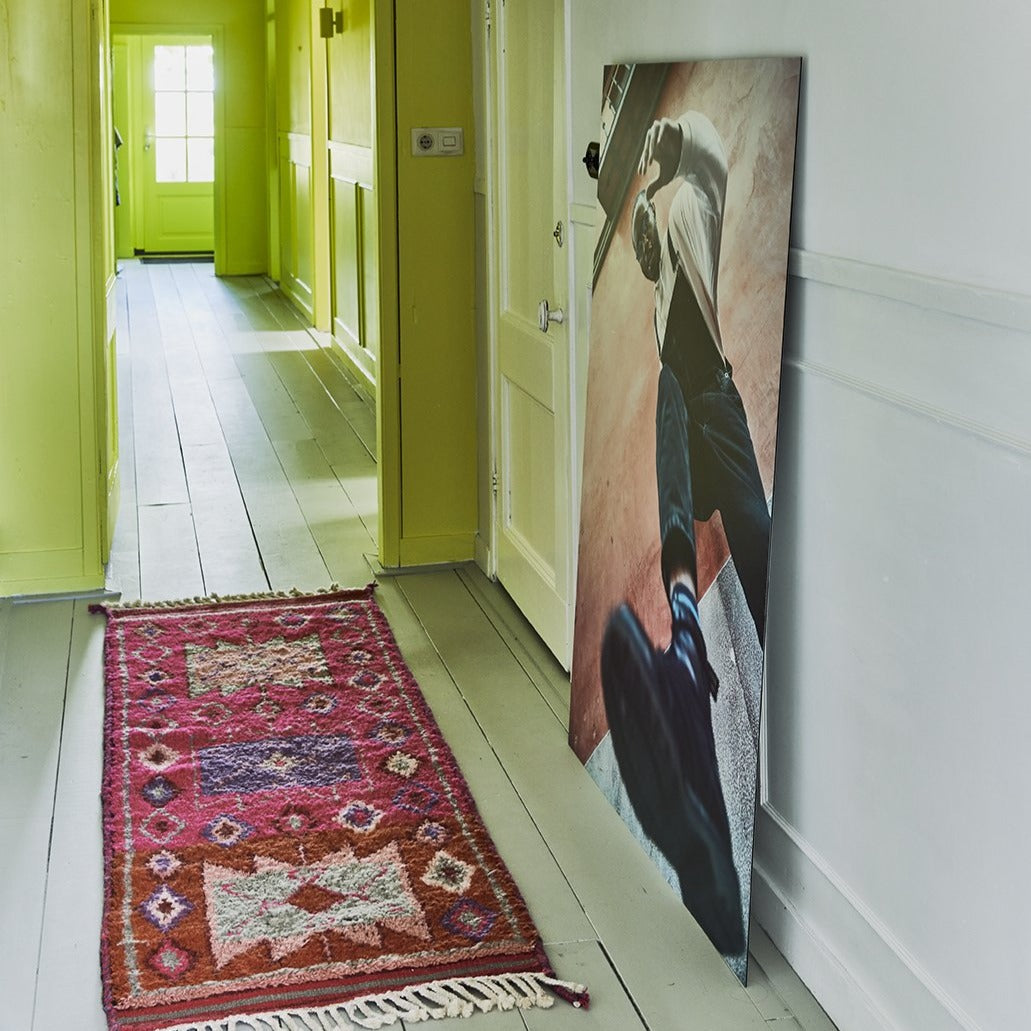 hallway with a pink, hand knotted woolen runner