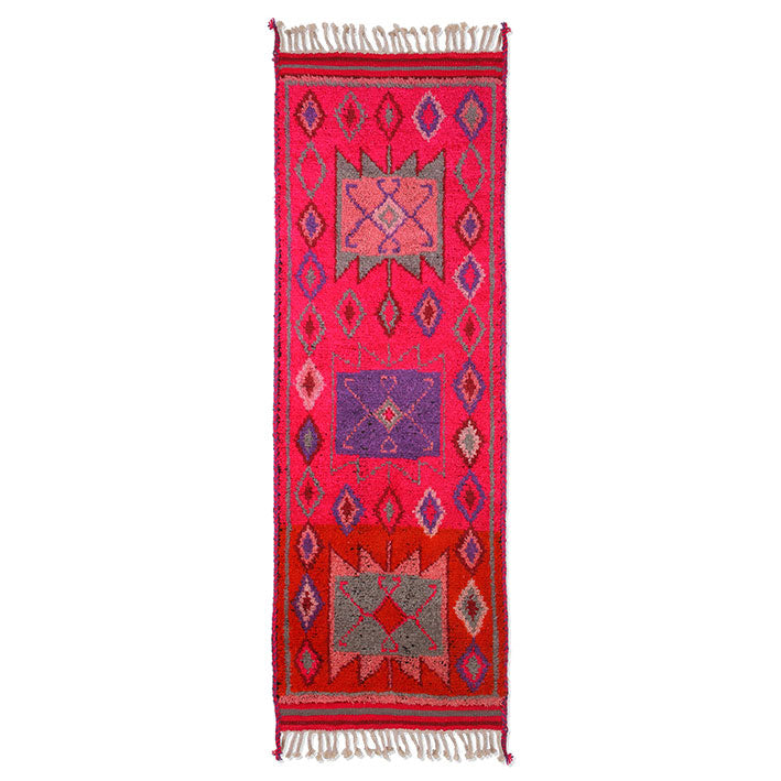 runner made of pink colored wool and blue and grey abstract patterns