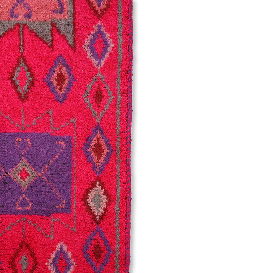 close up of a woolen runner in pink