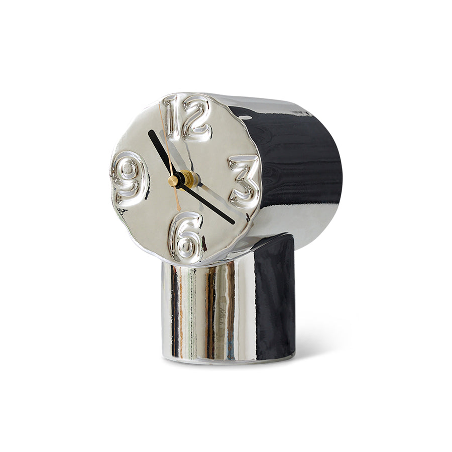 chrome colored ceramic clock with 4 numbers on a white background