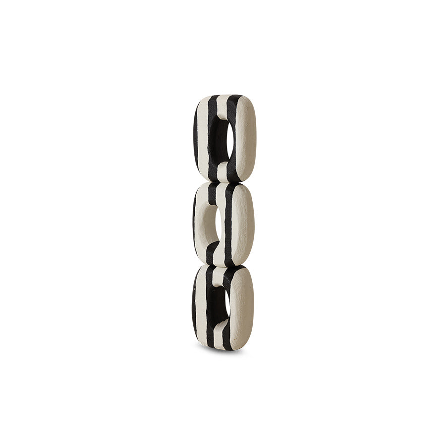 black and white sculpture on a white background