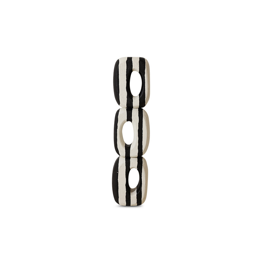 black and white sculpture on a white background