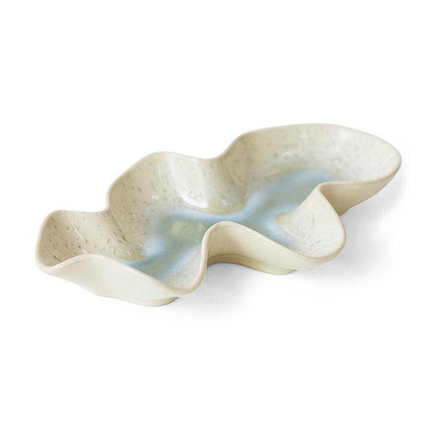 Wavy ceramic dish on a white background