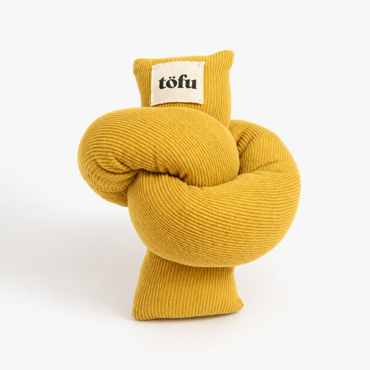 yellow knotted catnip toy made from corduroy 