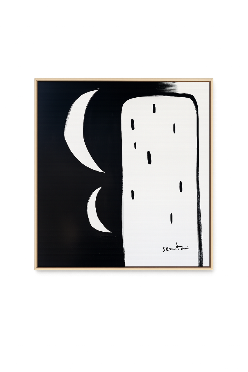 Abstract black and white artwork with moon phases in a gold frame.