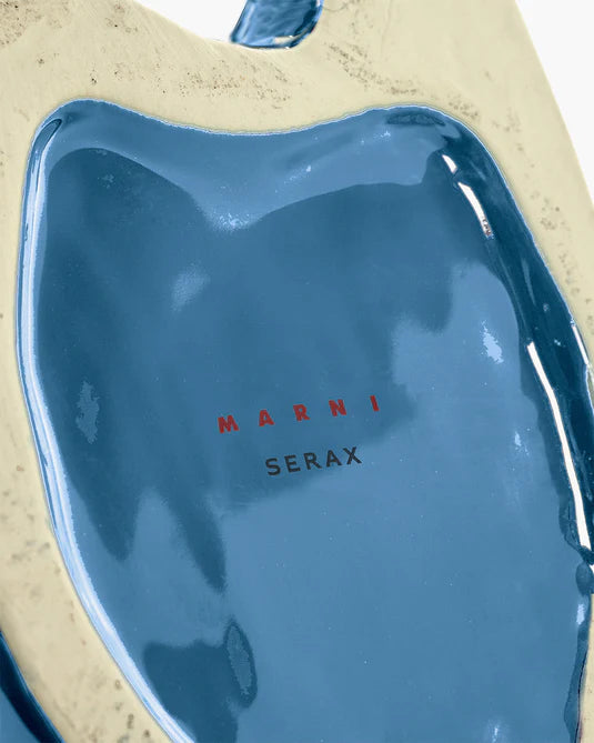 Blue Marni SERAX product on a beige background