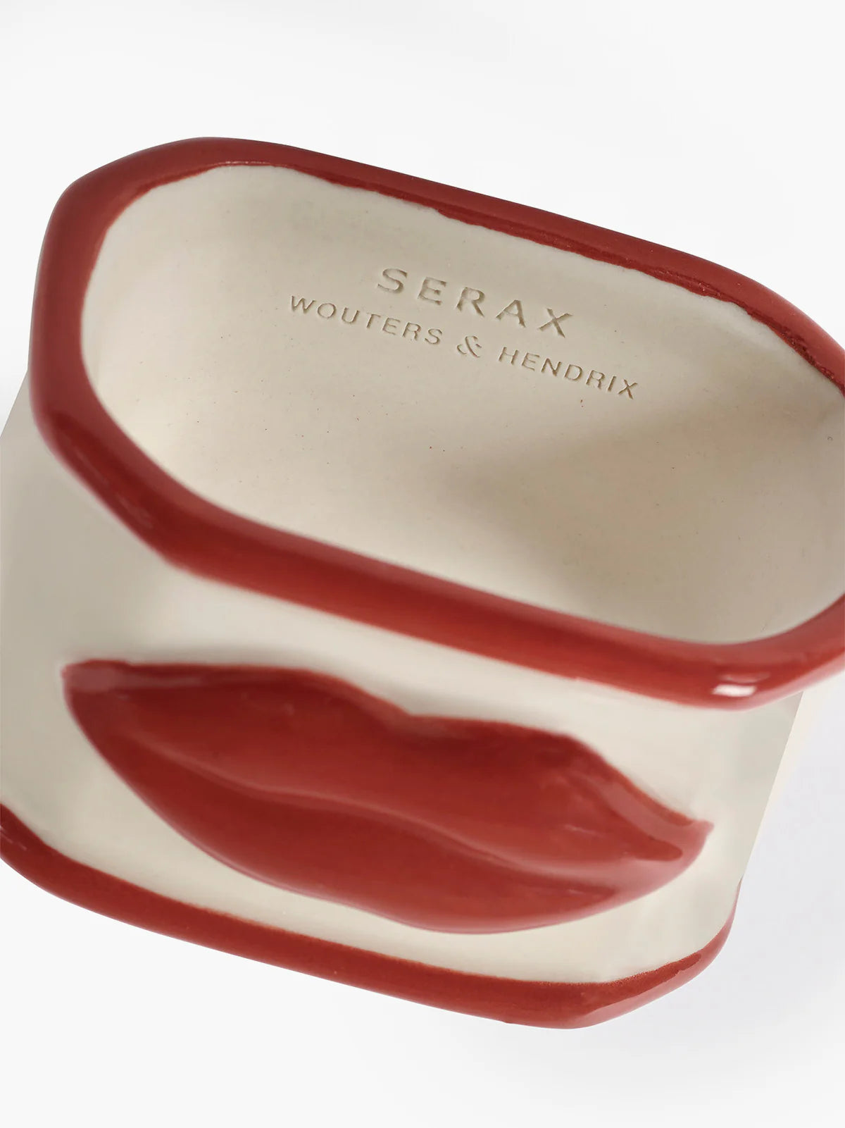 stoneware napkin ring with red lips and serax wouter and hendriks engravement
