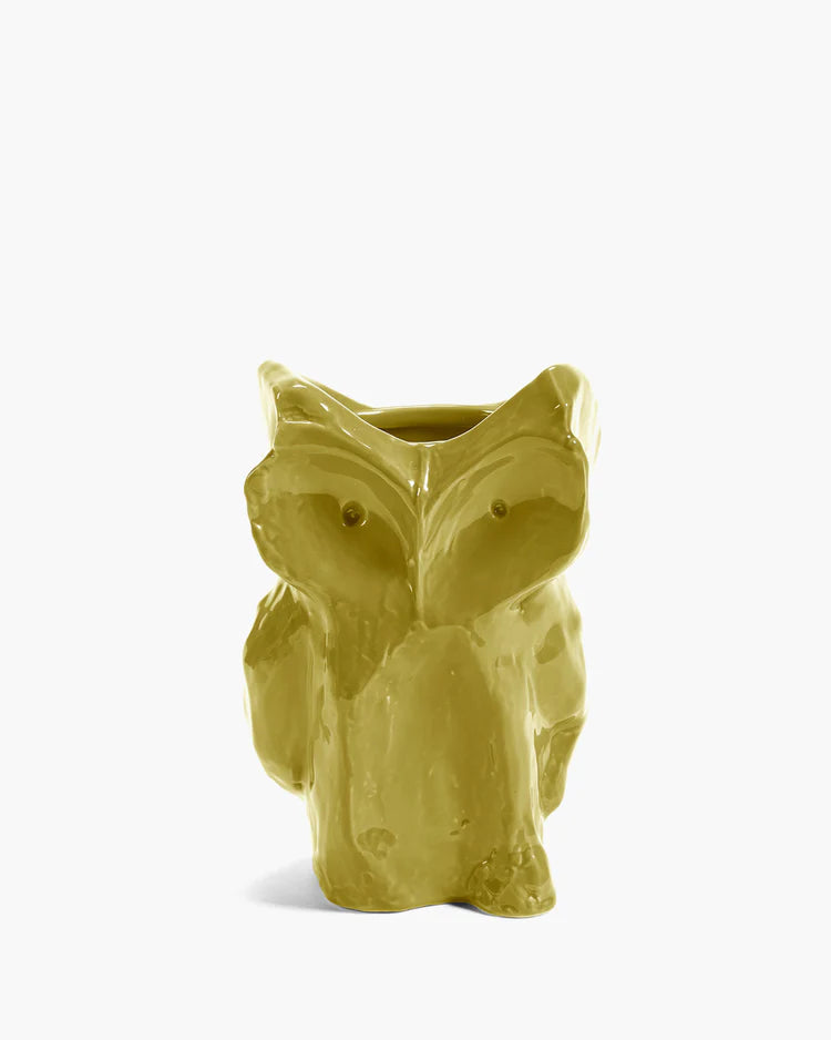 Yellow owl-shaped vase on a white background