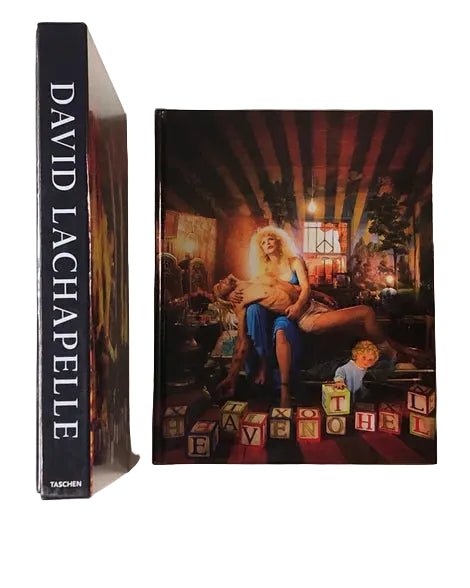 Book titled 'The Heaven of the Innocents' by David Lachapelle with a cover featuring a woman and child on a couch.