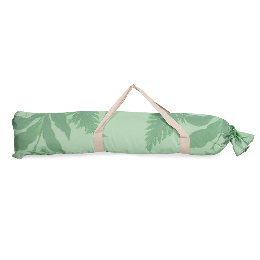carry bag forretro inspired beach umbrella in green with floral pattern and green fringes and wooden pole 
