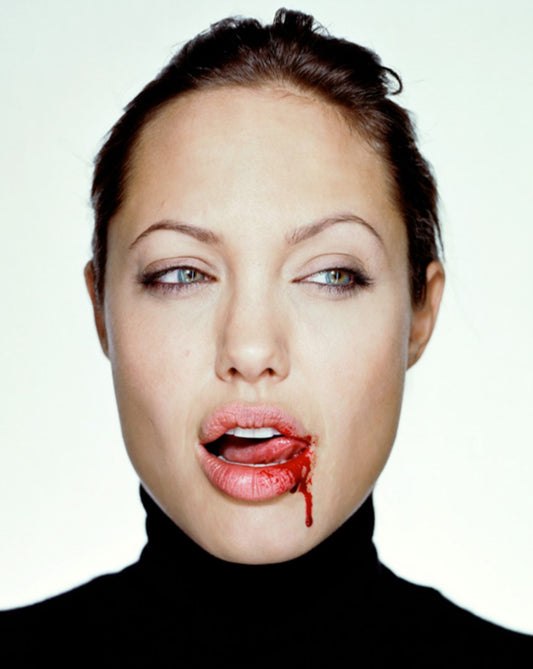 angelina jolie with blood by photographer Martin Schoeller