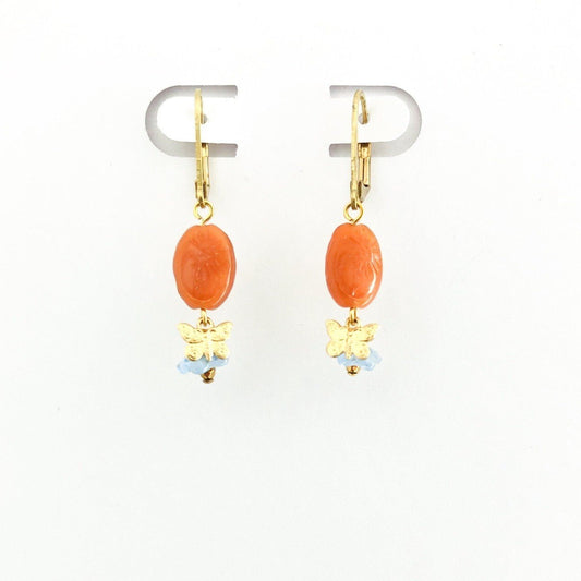 orange stone earrings with brass butterfly and blue flower