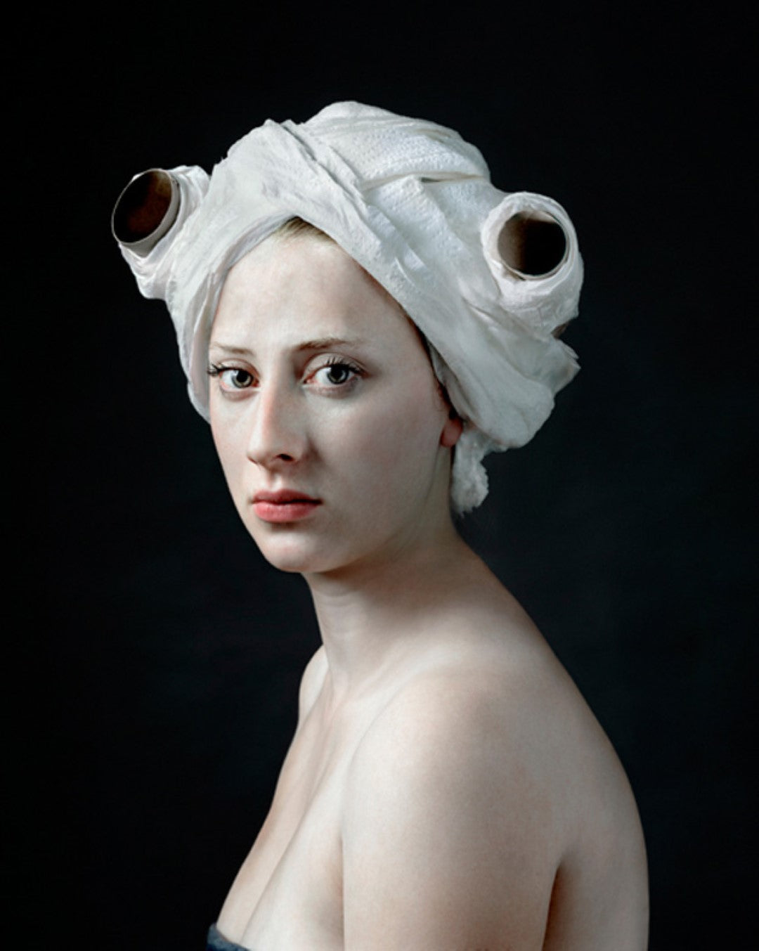 paper roll by hendrik kerstens woman with toilet paper on her head